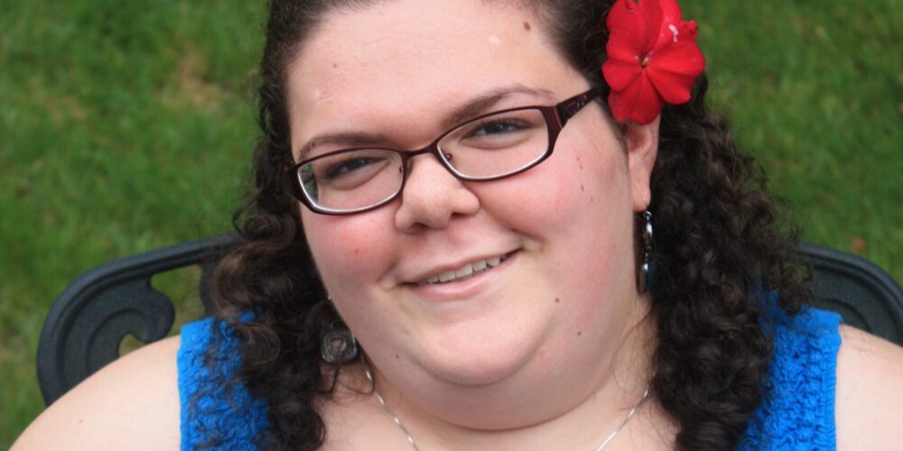 Photo of Emily Ladau - links to full photo and description