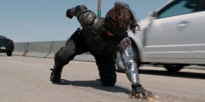 Screenshot from Captain America: The Winter Soldier showing the Winter Soldier in action, his arm clearly visible.